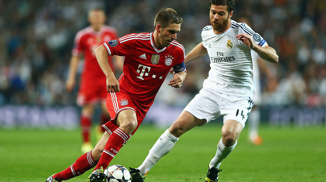 "Habe noch immer großen Spaß am Fußballspielen": Lahm (l.) gegen Alonso © 2014 Getty Images