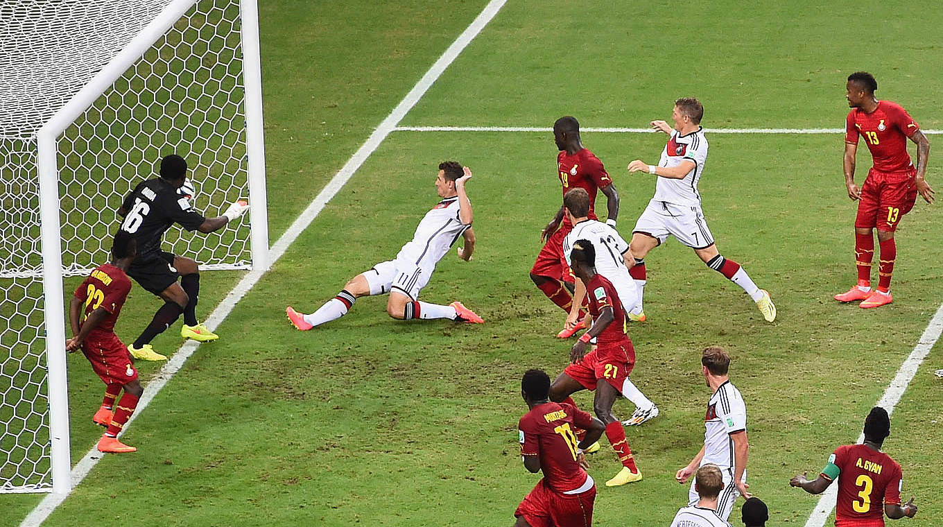 Klose nets a record 15th World Cup goal to ensure a share of the spoils © 2014 Getty Images