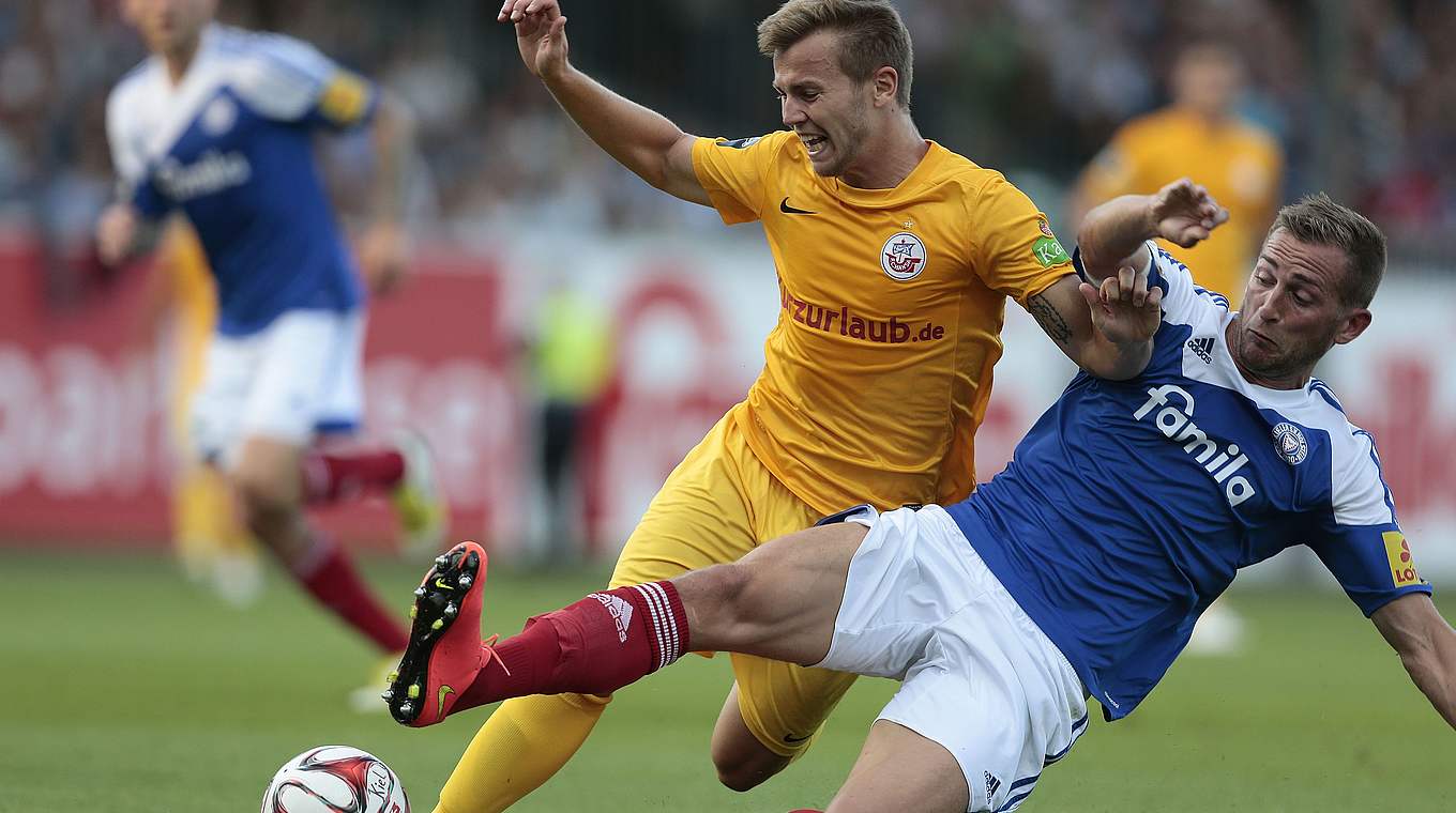 Kiels Marc Heider (r.): "Ohne Fußball würde mir etwas fehlen" © 2014 Getty Images
