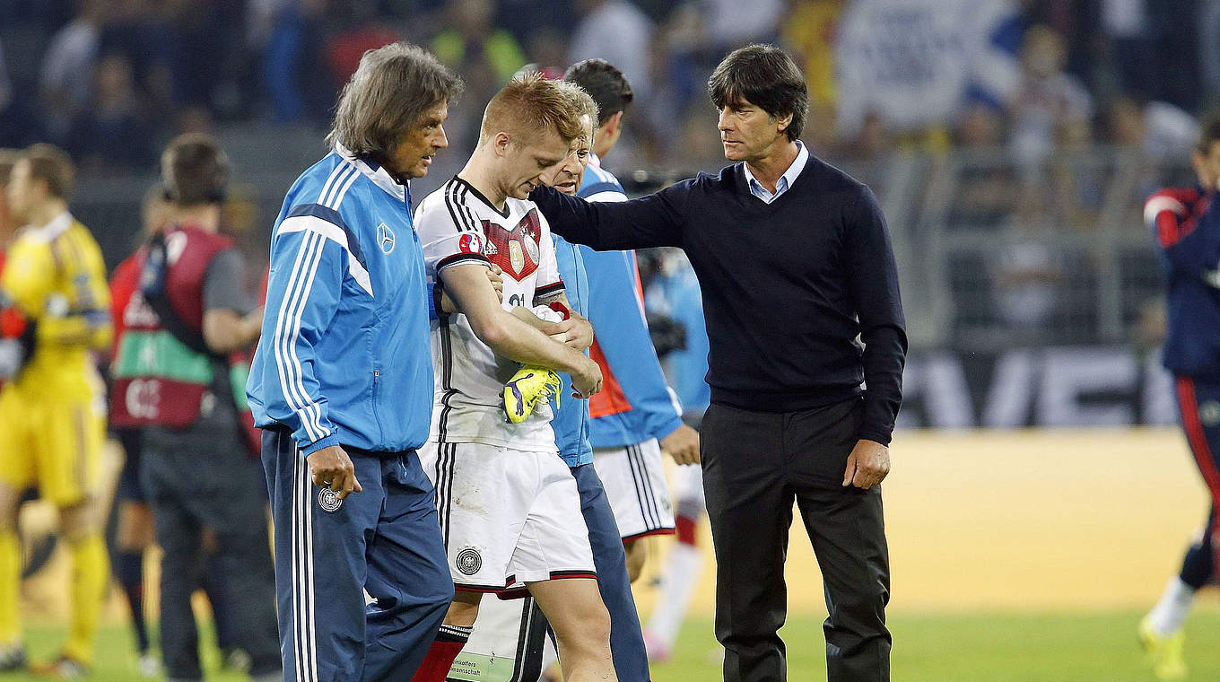 Hoping for a speedy recovery: Reus (centre) and Löw (right) © imago/Avanti