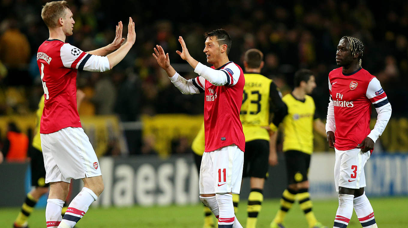 Jubeln für Arsenal: Per Mertesacker und Mesut Özil (v.l.) 2013 © imago sportfotodienst