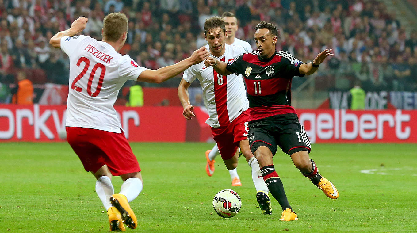 Ständiger Unruheherd in Polens Defensive: Karim Bellarabi (r.) © 2014 Getty Images