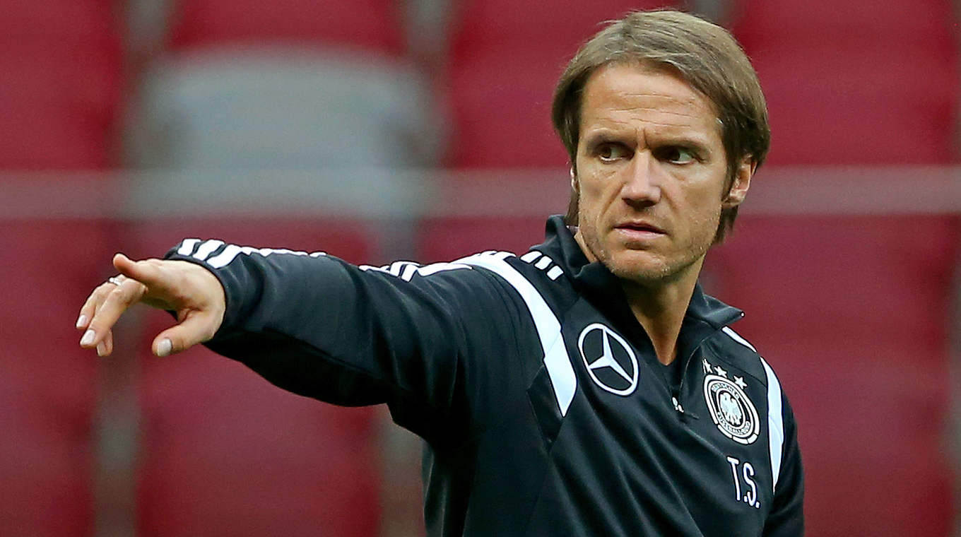 Germany assistant manager Thomas Schneider made the draw © 2014 Getty Images