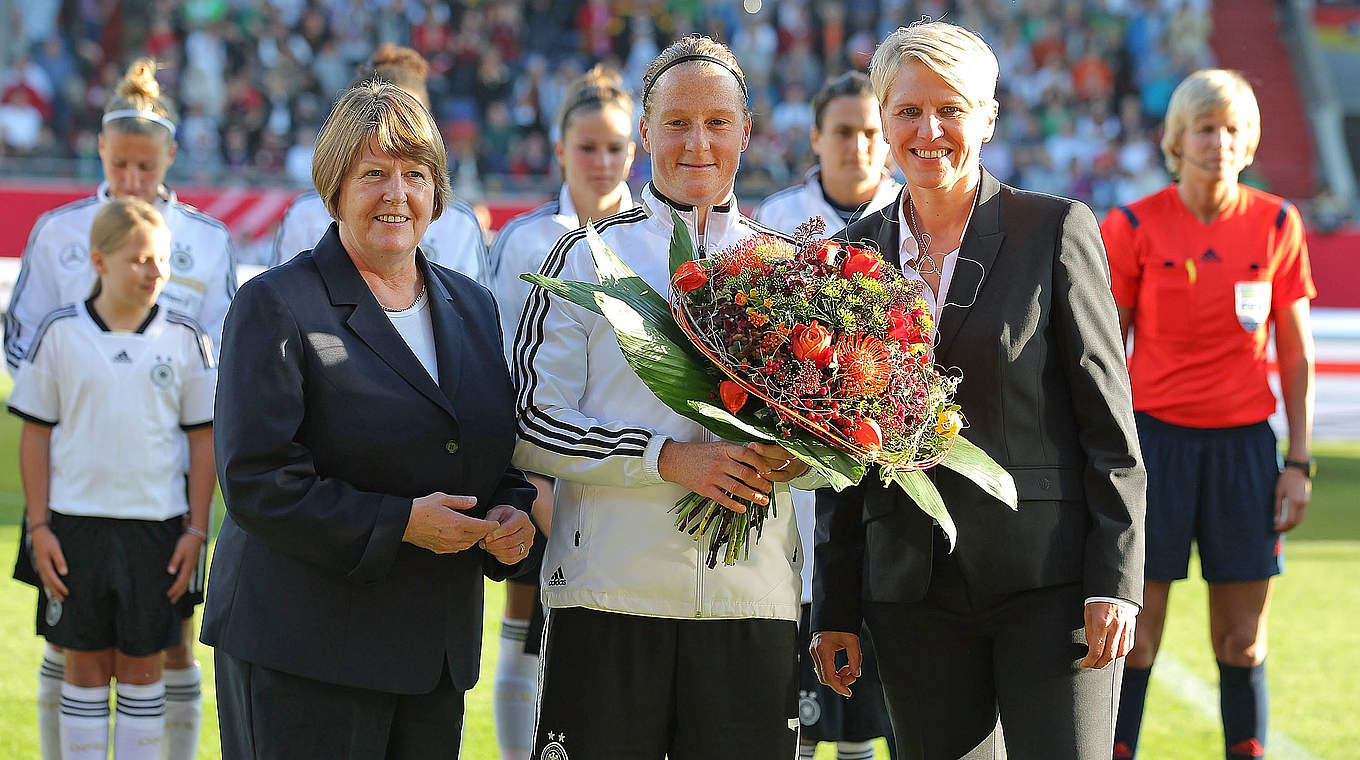 Behringer (middle) before her 100th international cap © 2014 Getty Images