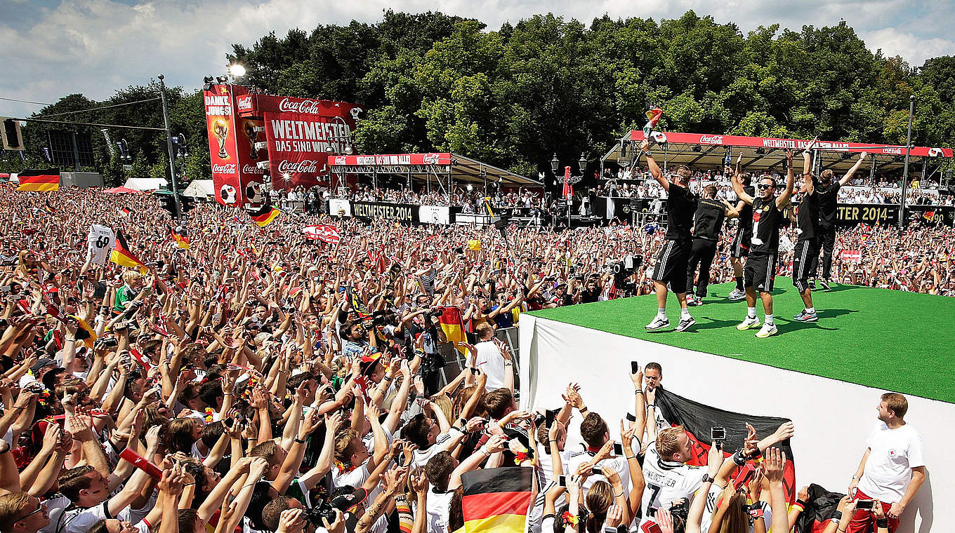 Fans lined the streets of Berlin to catch a glimpse of their heroes © 2014 Getty Images