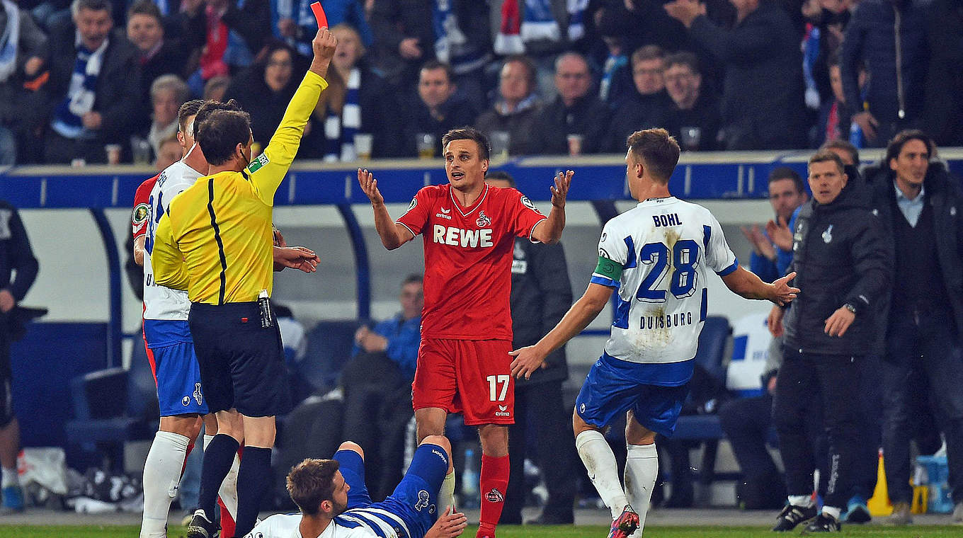 Drei Pokalspiele gesperrt: Kölns Slawomir Peszko (2.v.r.) © 2014 Getty Images
