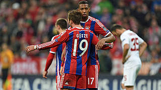 Boateng congratulates goal scorer Mario Götze © imago/Team 2