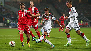 Mario Götze makes it 3-0 after a neat one-two with Max Kruse © 2014 Getty Images