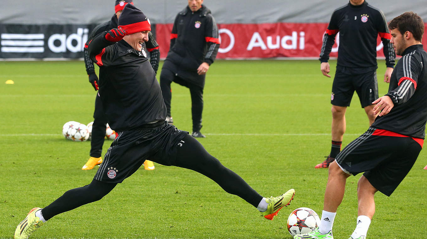 Bayern vice-captain Bastian Schweinsteiger is training well and has travelled to England © 2014 Getty Images