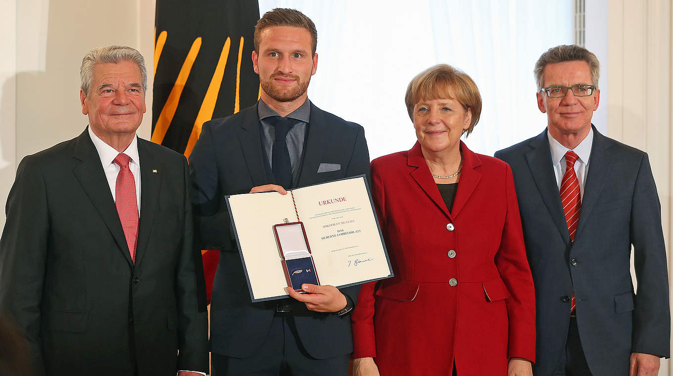 Mustafi and World Champions Germany were awarded the Silver Laurel Leaf  © 2014 Getty Images