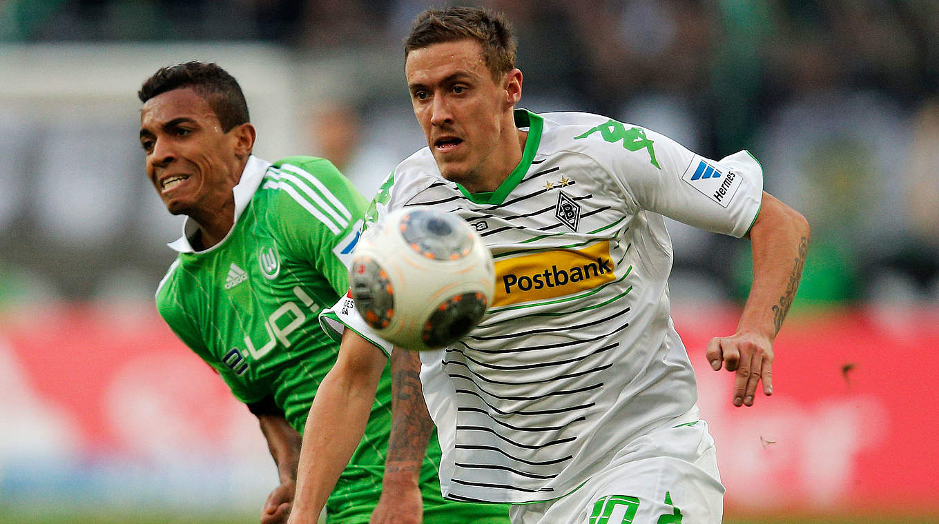 Rennen um die Champions League: Gladbachs Max Kruse (r.) und Wolfsburgs Luiz Gustavo © 2013 Getty Images