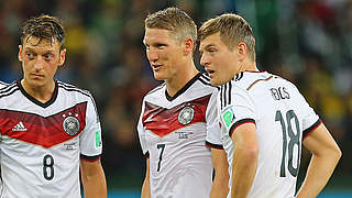 Three Germany midfielders candidates for the World XI: Özil, Schweinsteiger and Kroos © 2014 Getty Images
