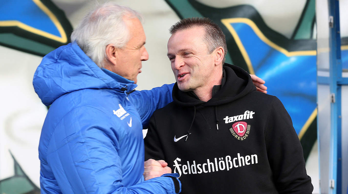 Rostock manager Vollmann und Dynamo manager Böger exchange a handshake © 2014 Getty Images