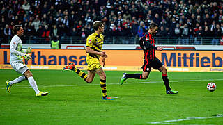 Frankfurt's Seferovic scoring past Dortmund's Weidenfeller. © 2014 Getty Images