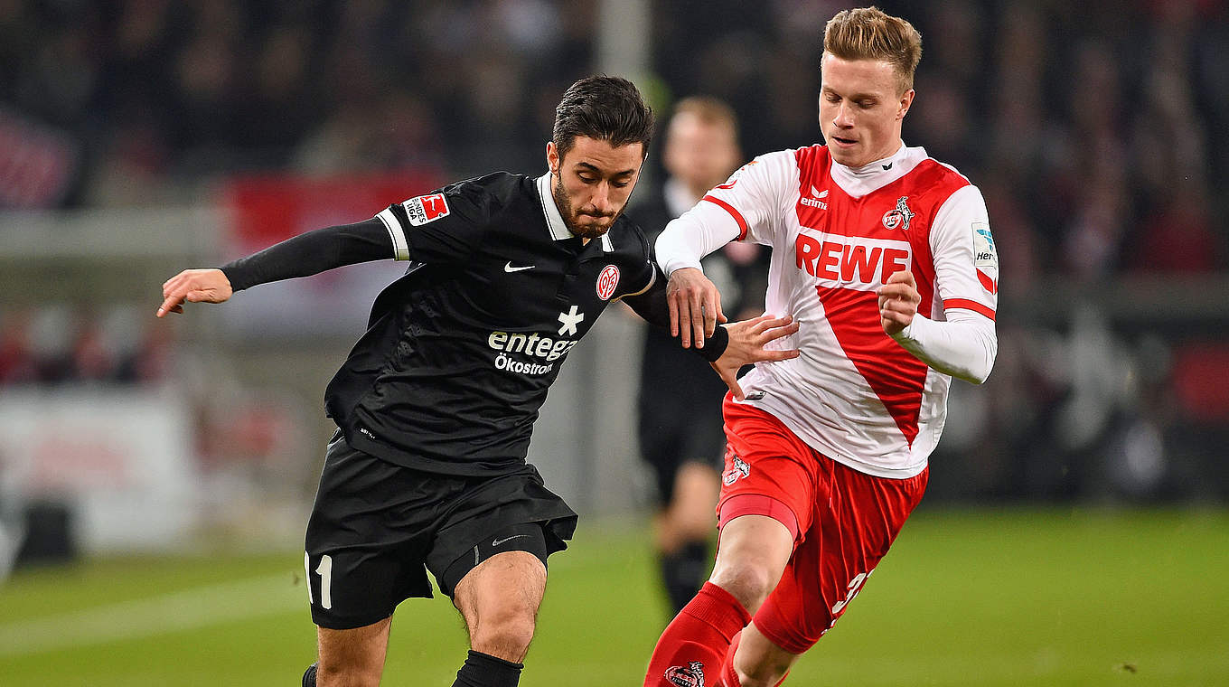 Duell in Köln-Müngersdorf: Yunus Malli (l.) gegen Yannick Gerhardt vom FC © 2014 Getty Images