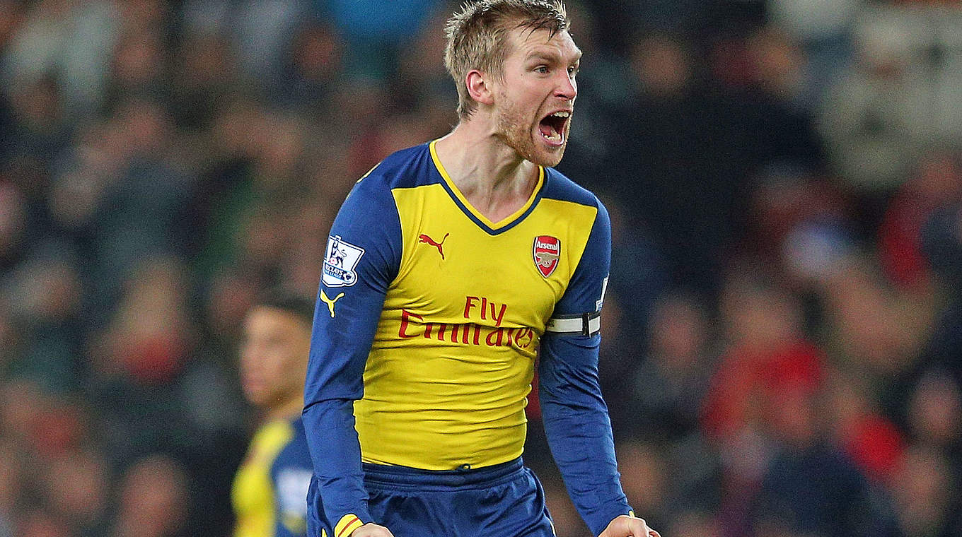 Mertesacker and Arsenal won in the London derby © 2014 Getty Images