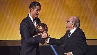 Cristiano Ronaldo is awarded the Ballon d'Or by FIFA president Sepp Blatter © 
