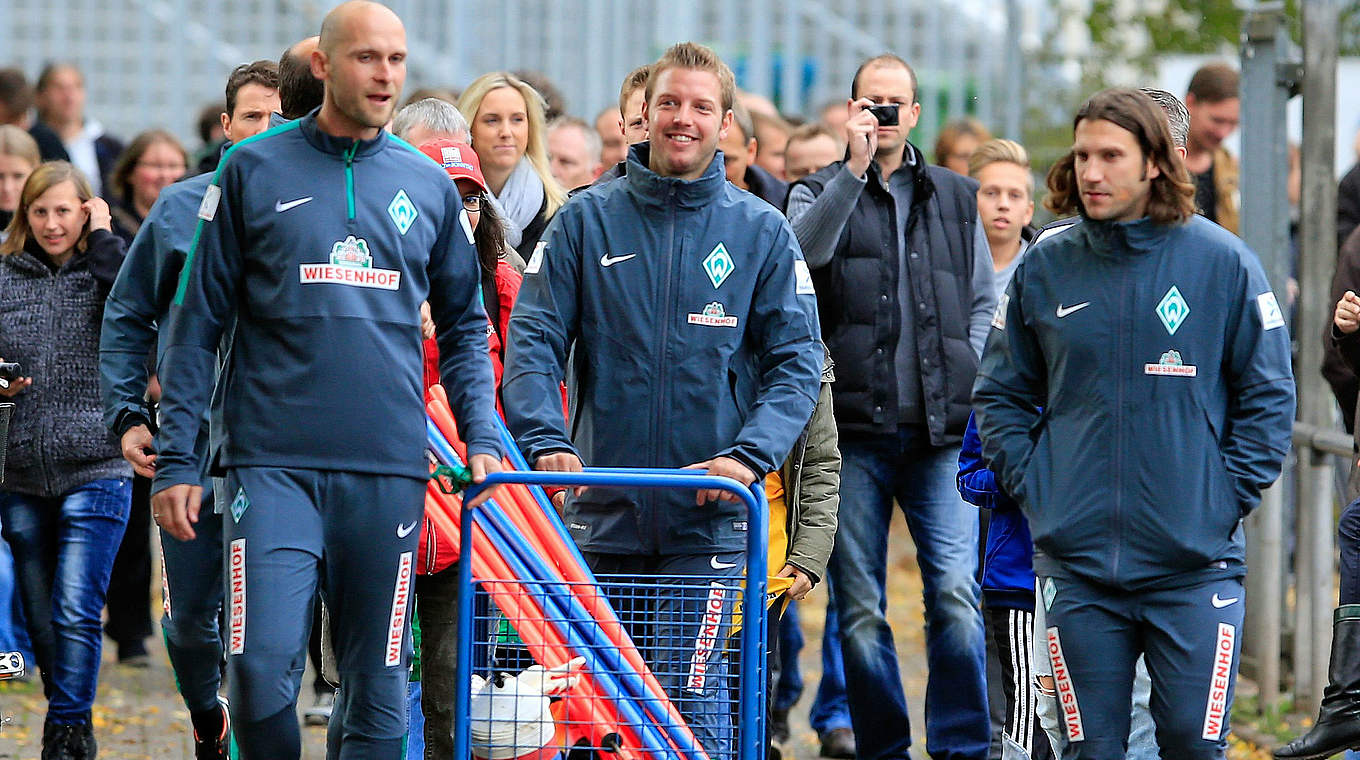 Kohfeldt (M.) und Frings (r.) mit Werder-Coach Skripnik: "Bis zum Schluss gegen Abstieg" © 2014 Getty Images