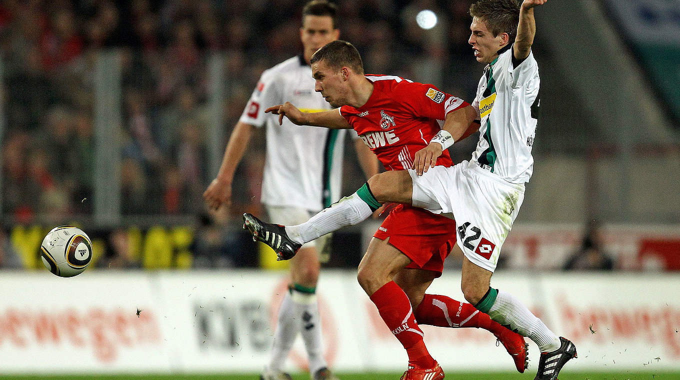 Duell aus 2010: Lukas Podolski (l.) gegen Patrick Herrmann © 2010 Getty Images