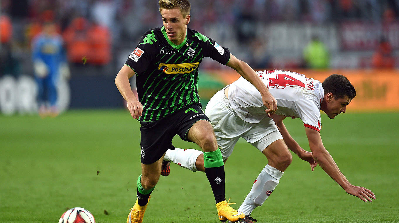 Abgehängt: Herrmann (v.) gegen Kölns Nationalspieler Jonas Hector © PATRIK STOLLARZ/AFP/Getty Images