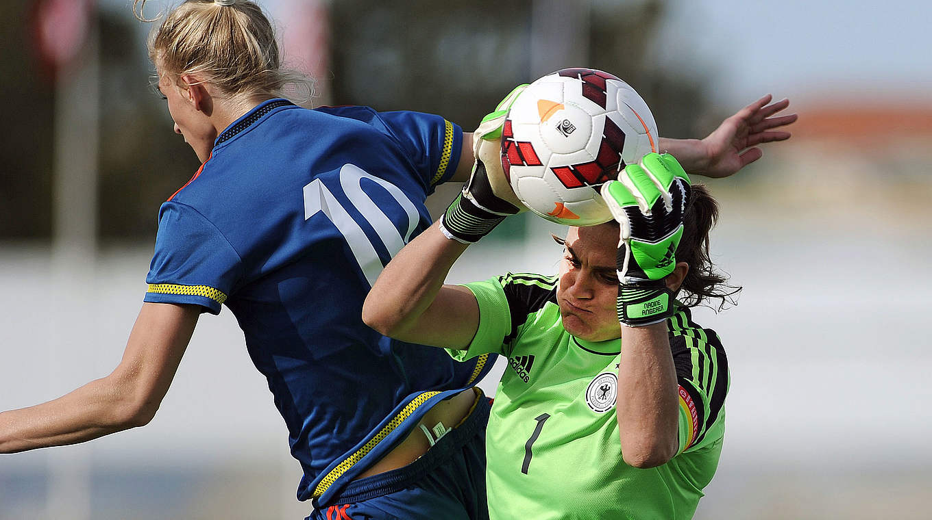Sweden's double scorer Jakobsson against Angerer  © AFP/GettyImages