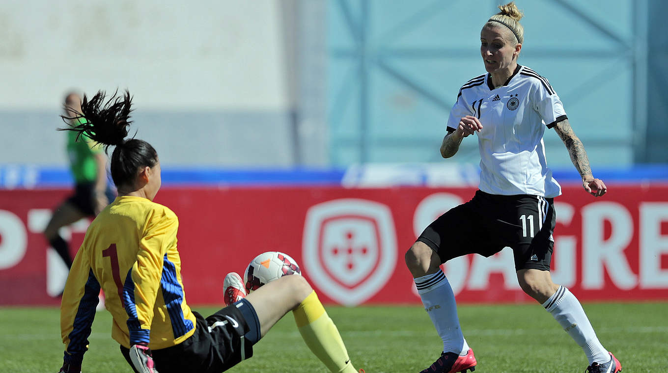 Anja Mittag (r.) gegen China: "Wir haben es in diesem Spiel viel besser gemacht" © 2015 Getty Images