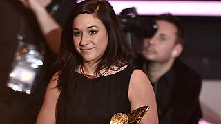 The 2014 World Player of the Year Nadine Keßler with the Ballon d'Or award © 