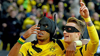 The dream team of Aubameyang and Reus celebrate as Batman and Robin  © 2015 Getty Images
