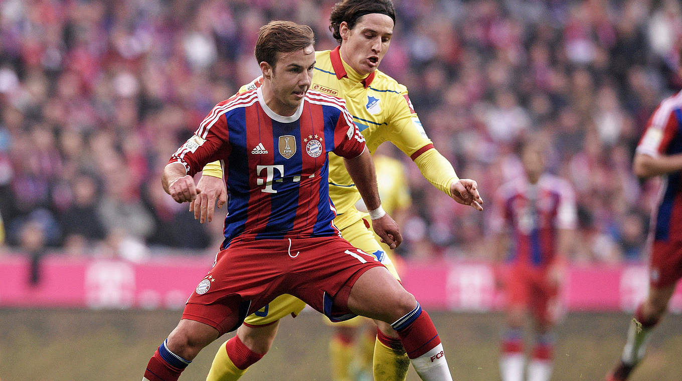 Battle of two Germany internationals: Bayern's Götze against Hoffenheim's Rudy  © 2014 Getty Images