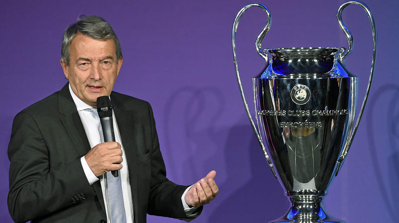 DFB President Wolfgang Niersbach alongside the Champions League trophy © 