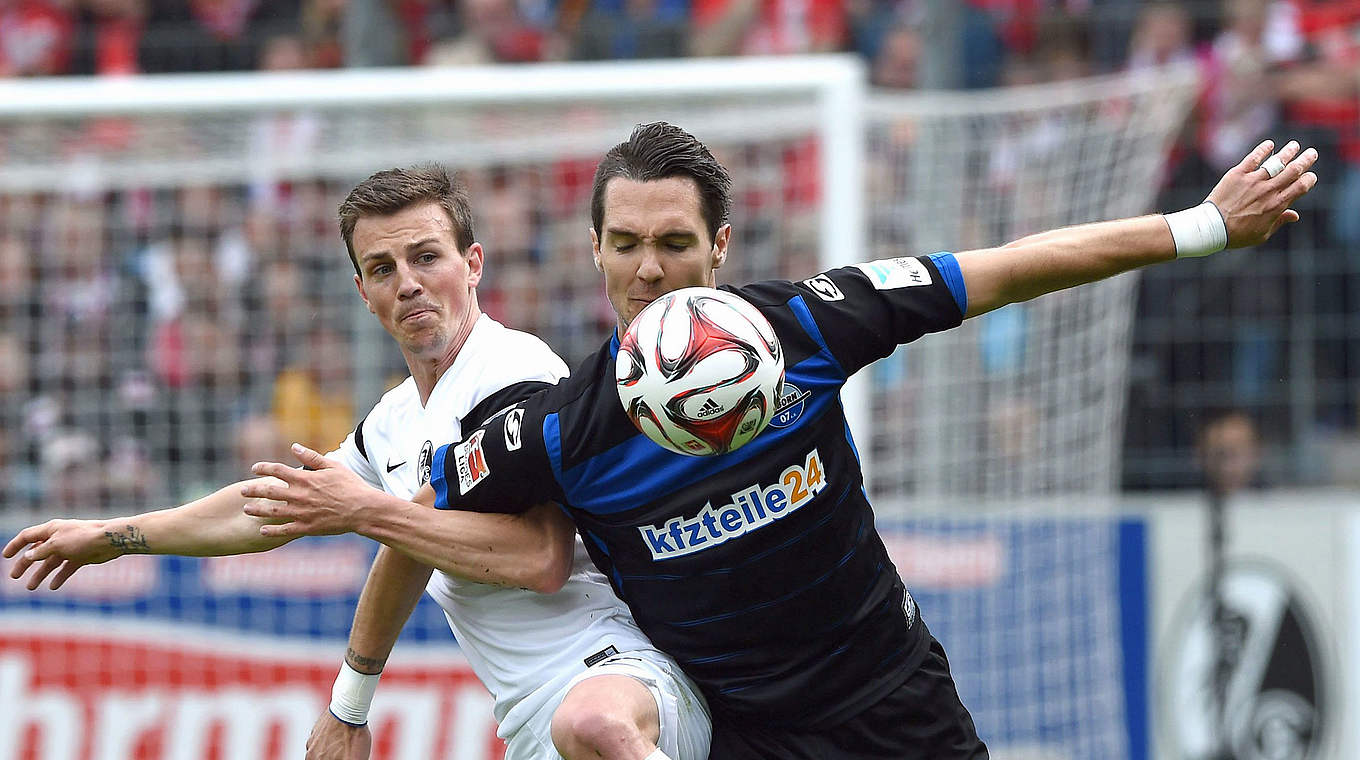 Freiburg's Vladimir Darida battling with Srdjan Lakic from SC Paderborn © 2015 Getty Images