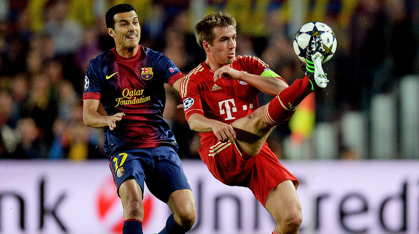 Traf mit den Bayern bereits 2013 im Halbfinale auf den FC Barcelona: Philipp Lahm (r.) © 2013 Getty Images