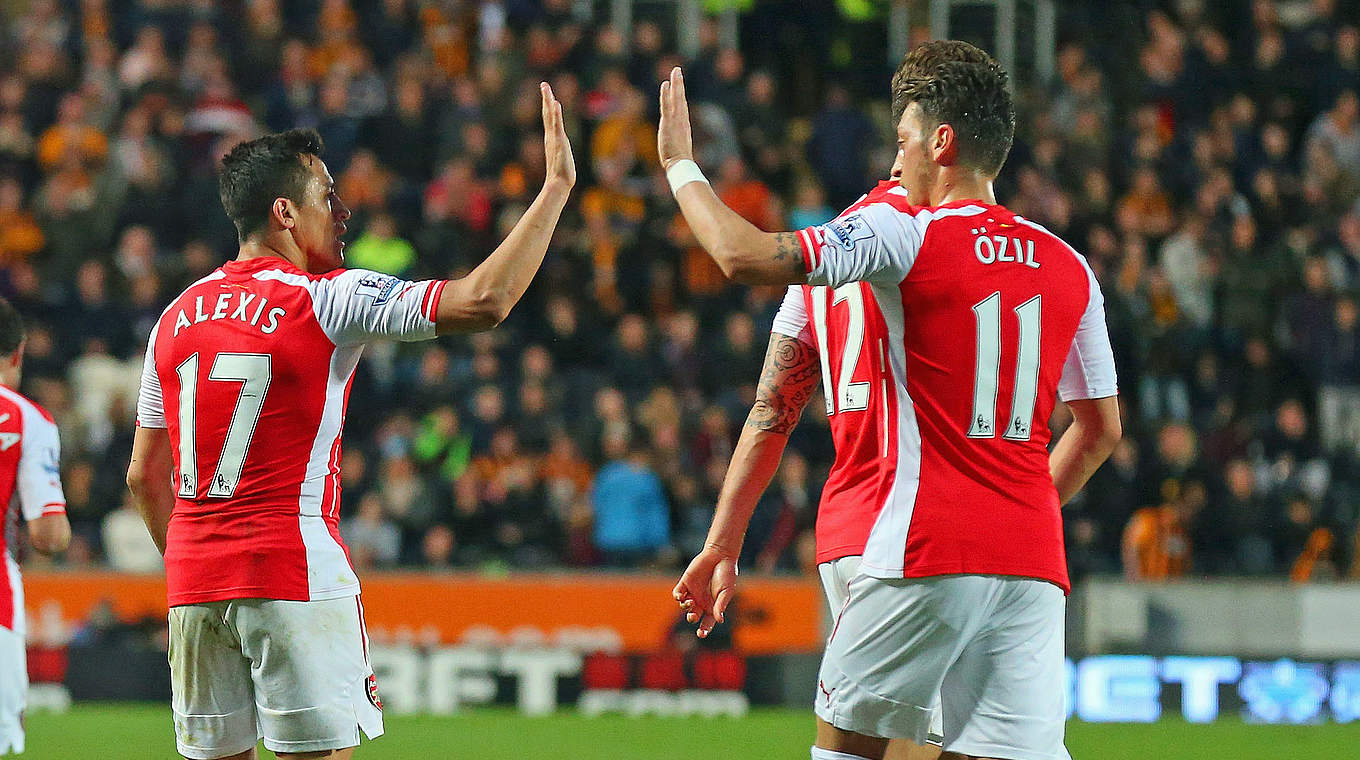 World Champion Özil and goal scorer Sanchez have the Champions League in their sights © 2015 Getty Images