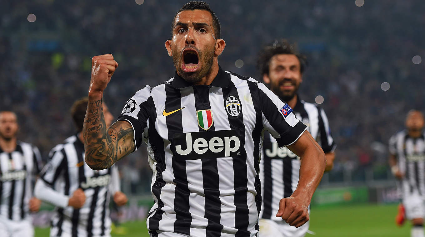 Carlos Tevez celebrates after scoring the penalty to put his side 2-1 ahead © 2015 Getty Images