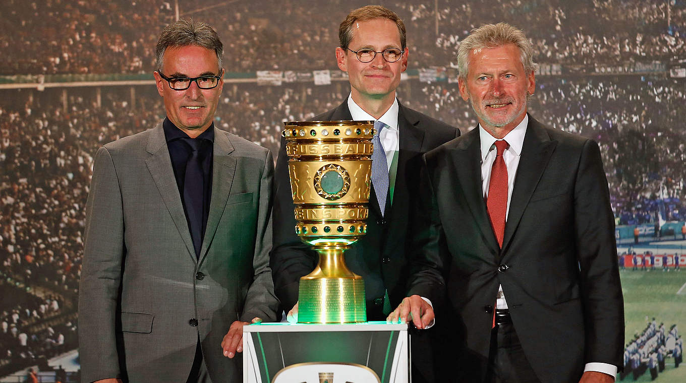 Helmut Sandrock, Michael Müller and Paul Breitner with the DFB Cup © 2015 Getty Images