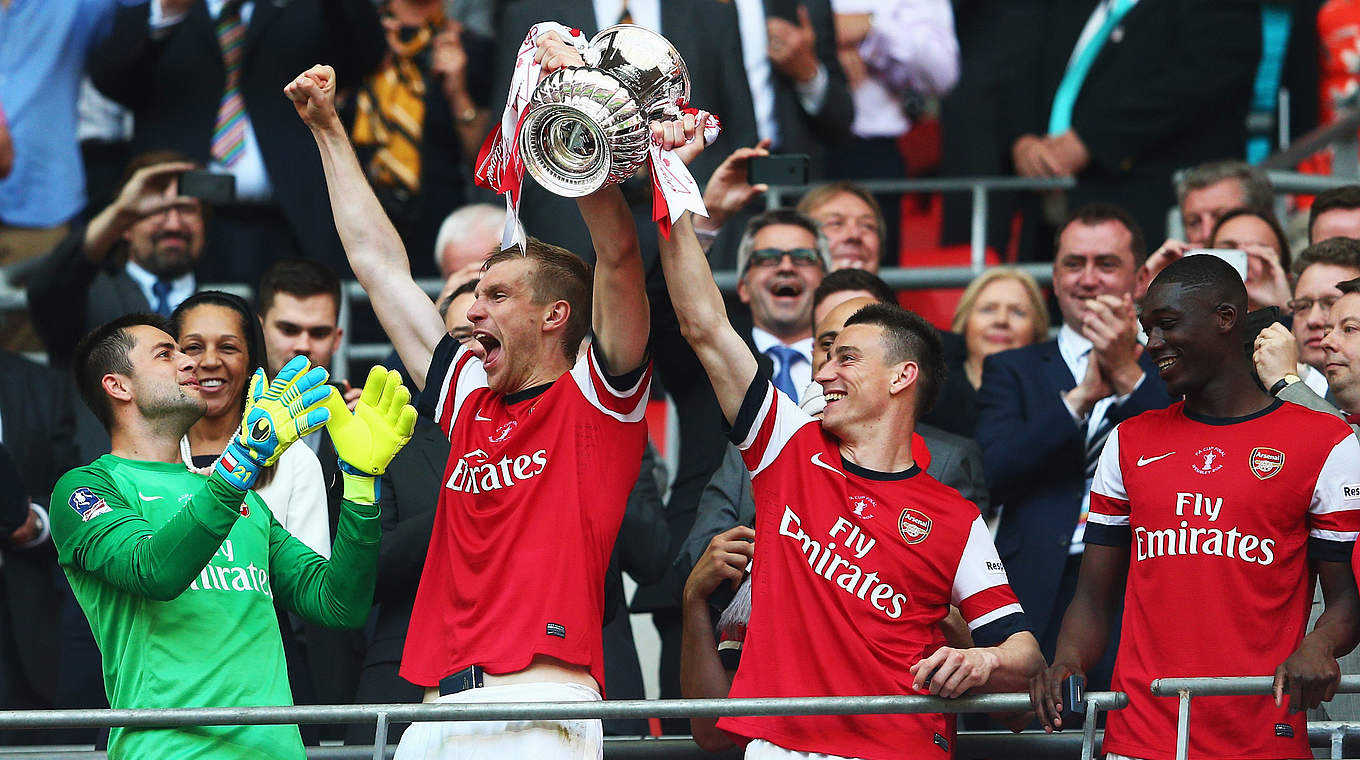2014 FA Cup win ended "9 years without a trophy" for Arsenal.  © 2014 Getty Images
