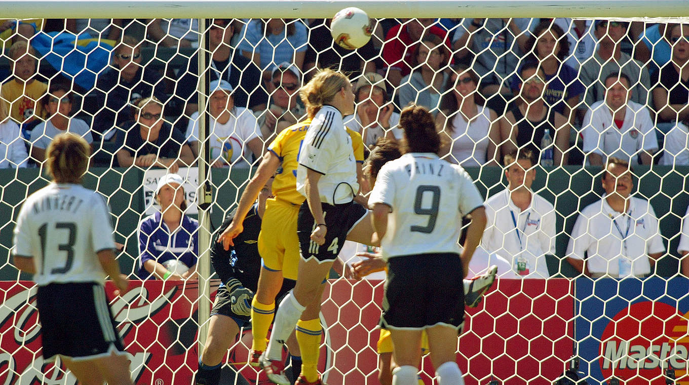 Nia Künzer heads it in to win the World Cup for Germany against Sweden in 2003.   © Bongarts/GettyImages