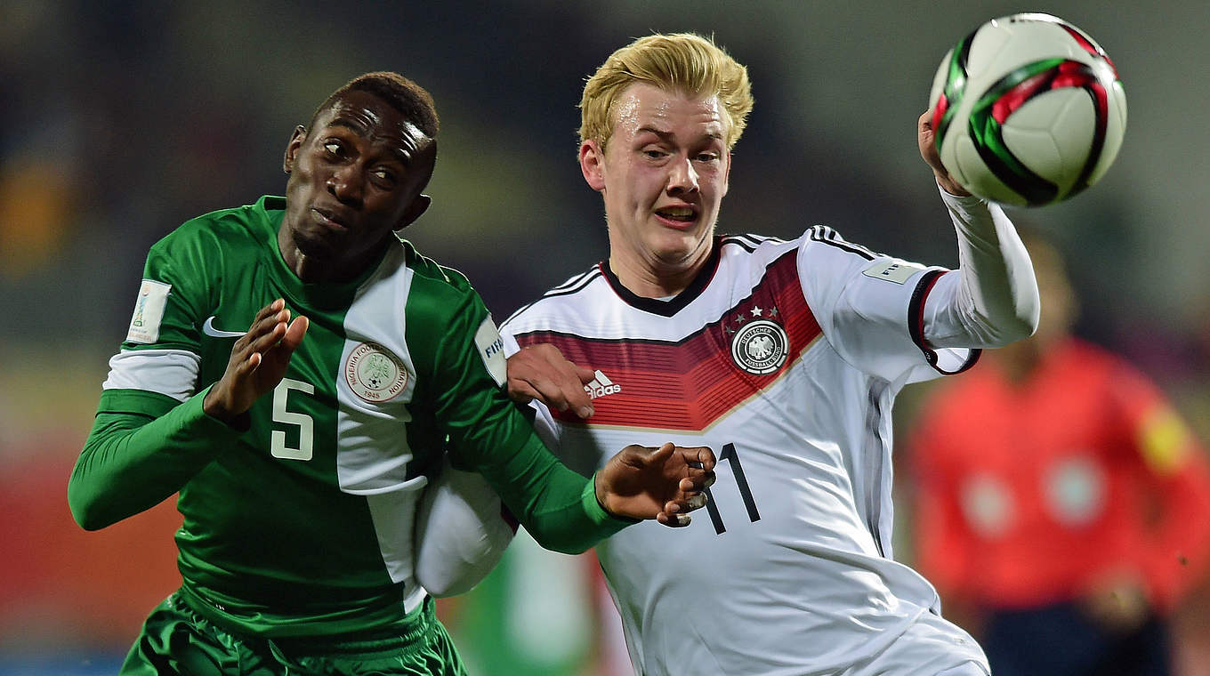 Eyes on the ball: Germany's Julian Brandt challenges Onyinye Ndidi © 2015 FIFA