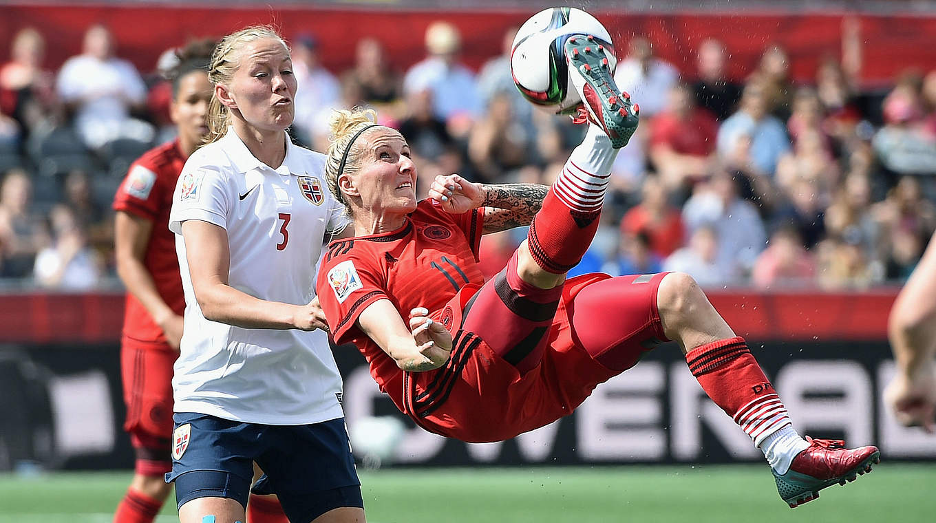 Anja Mittag attempts a bicycle kick   © 2015 Getty Images