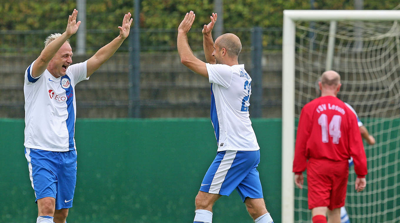 Hattrick mit Hansa: Stefan Beinlich (M.) und Rostock sind Ü 40-Cup-Rekordgewinner © 2014 Getty Images