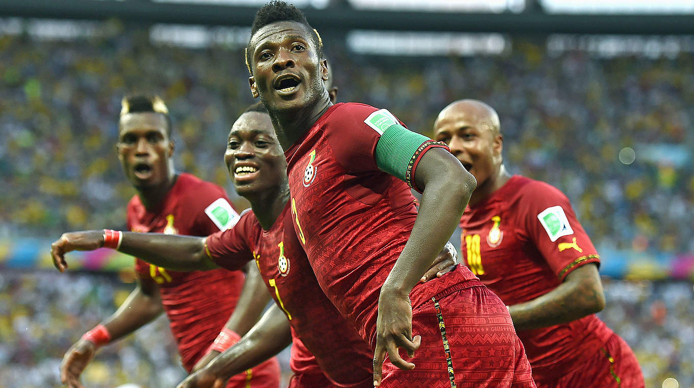 Ghana celebrate after Gyan fires them in front © 2014 Getty Images