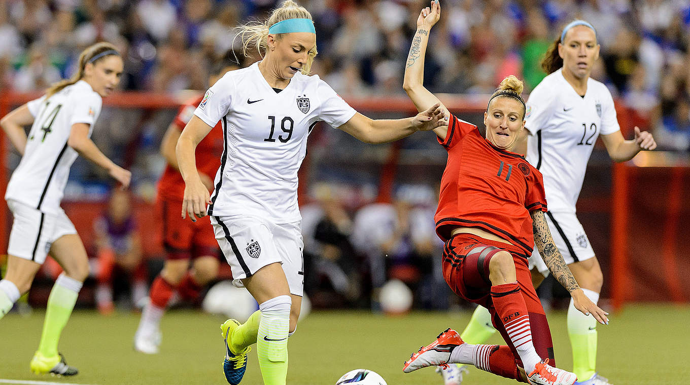 Anja Mittag gets stuck in © 2015 Getty Images