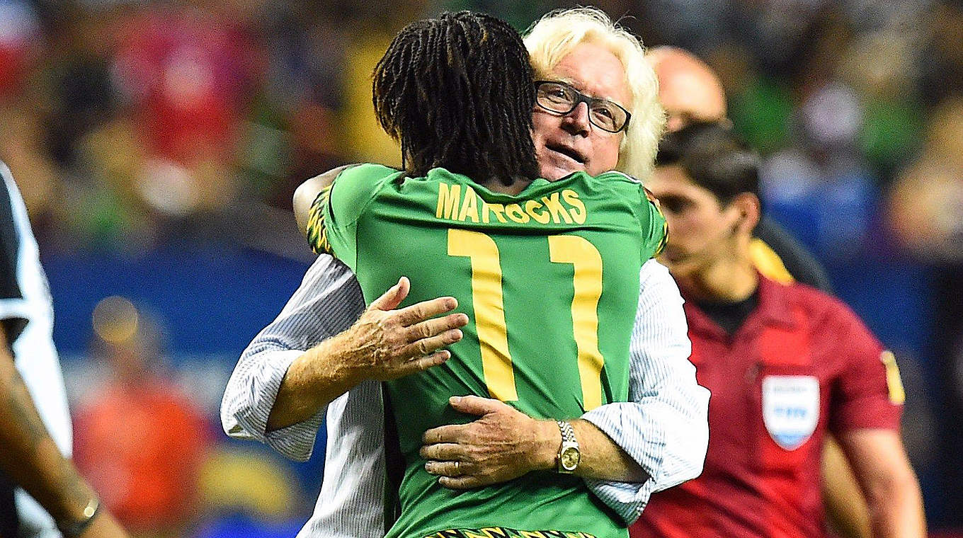 Jamaica manager hugs goalscorer Mattocks during their famous semi-final win © NICHOLAS KAMM/AFP/Getty Images
