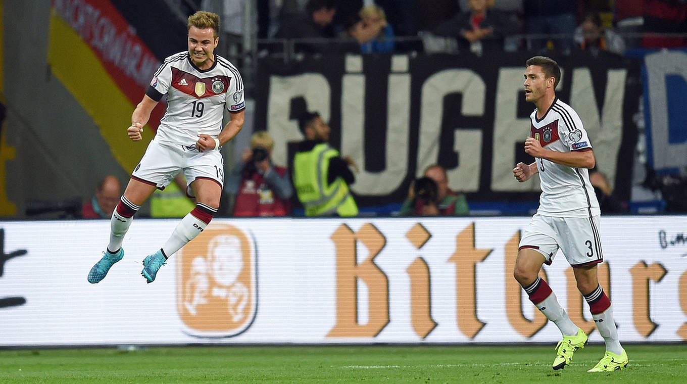 Götze celebrates with Jonas Hector, who set up the first two goals © GES/Markus Gilliar