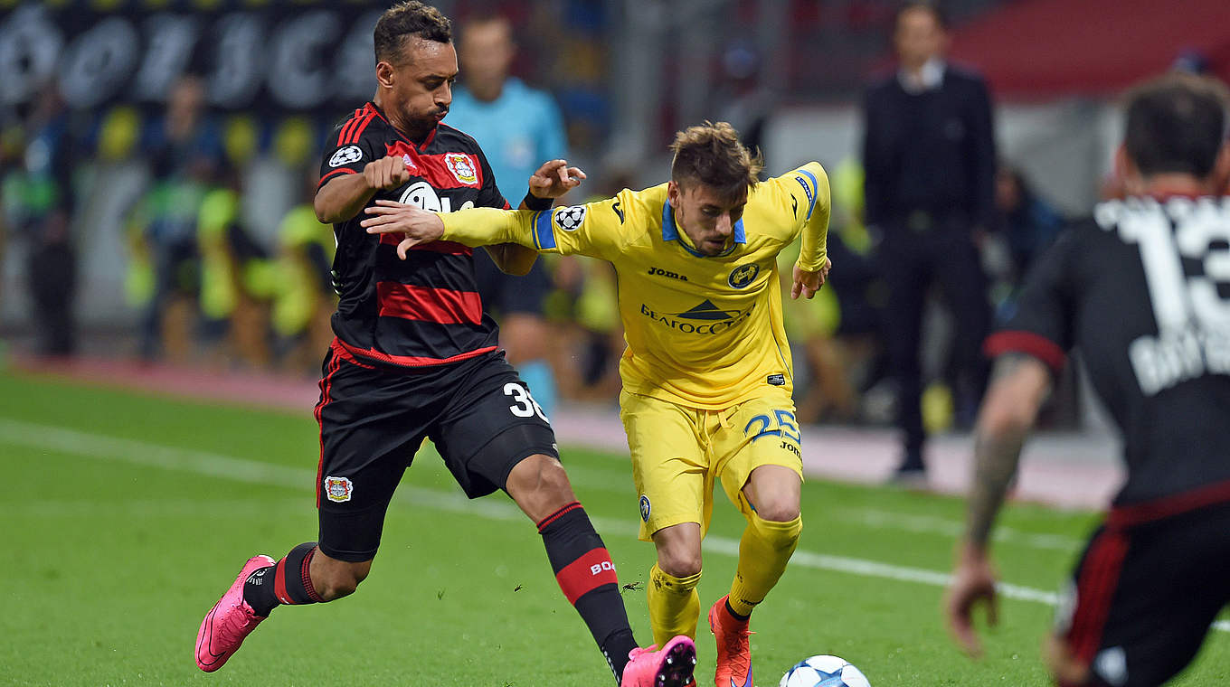 Karim Bellarabi stepping in to win the ball back for Bayer.  © 