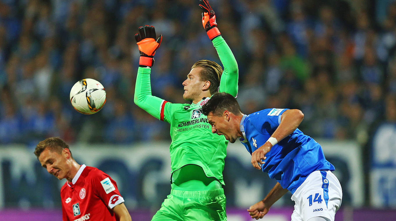 Loris Karius and Sandro Wagner battling for the ball in the air. © 2015 Getty Images