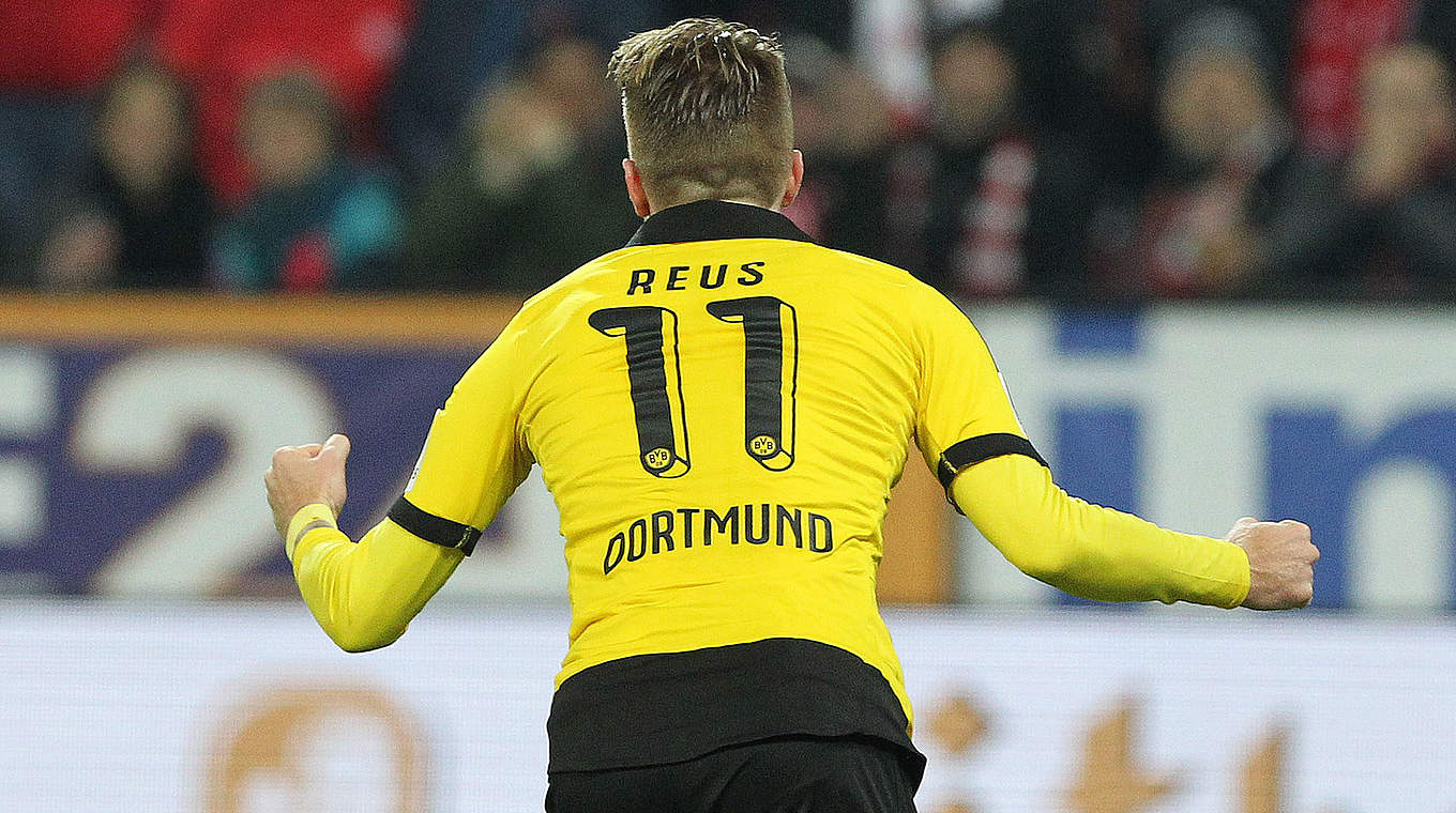 Germany international Marco Reus celebrates Dortmund's opening goal. © DANIEL ROLAND/AFP/Getty Images