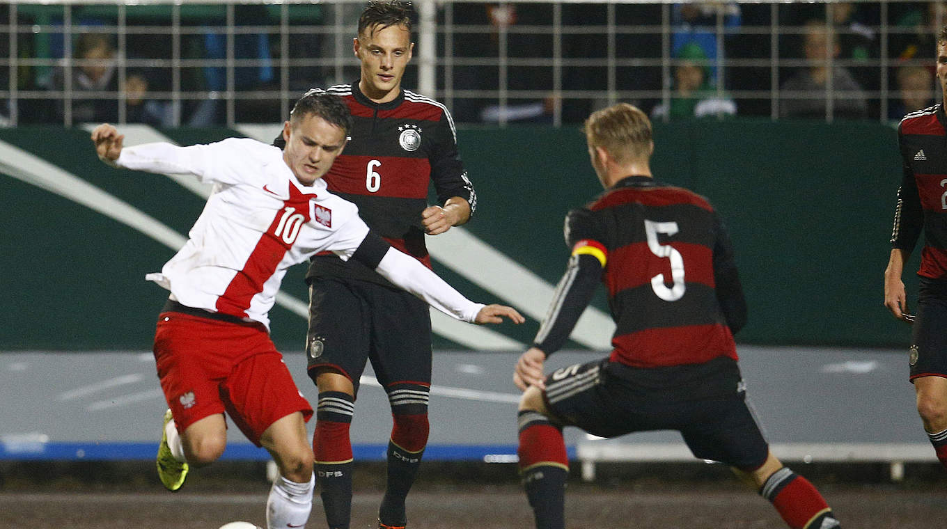 Robert Bauer and Marvin Schulz defend against Dawid Kort © 2015 Getty Images