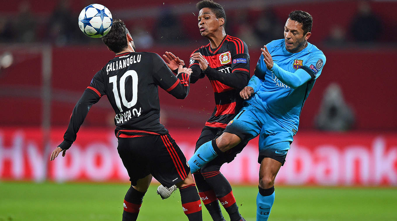 Hakan Calhanoglu and Wendell beat Adriano to the ball  © 2015 Getty Images