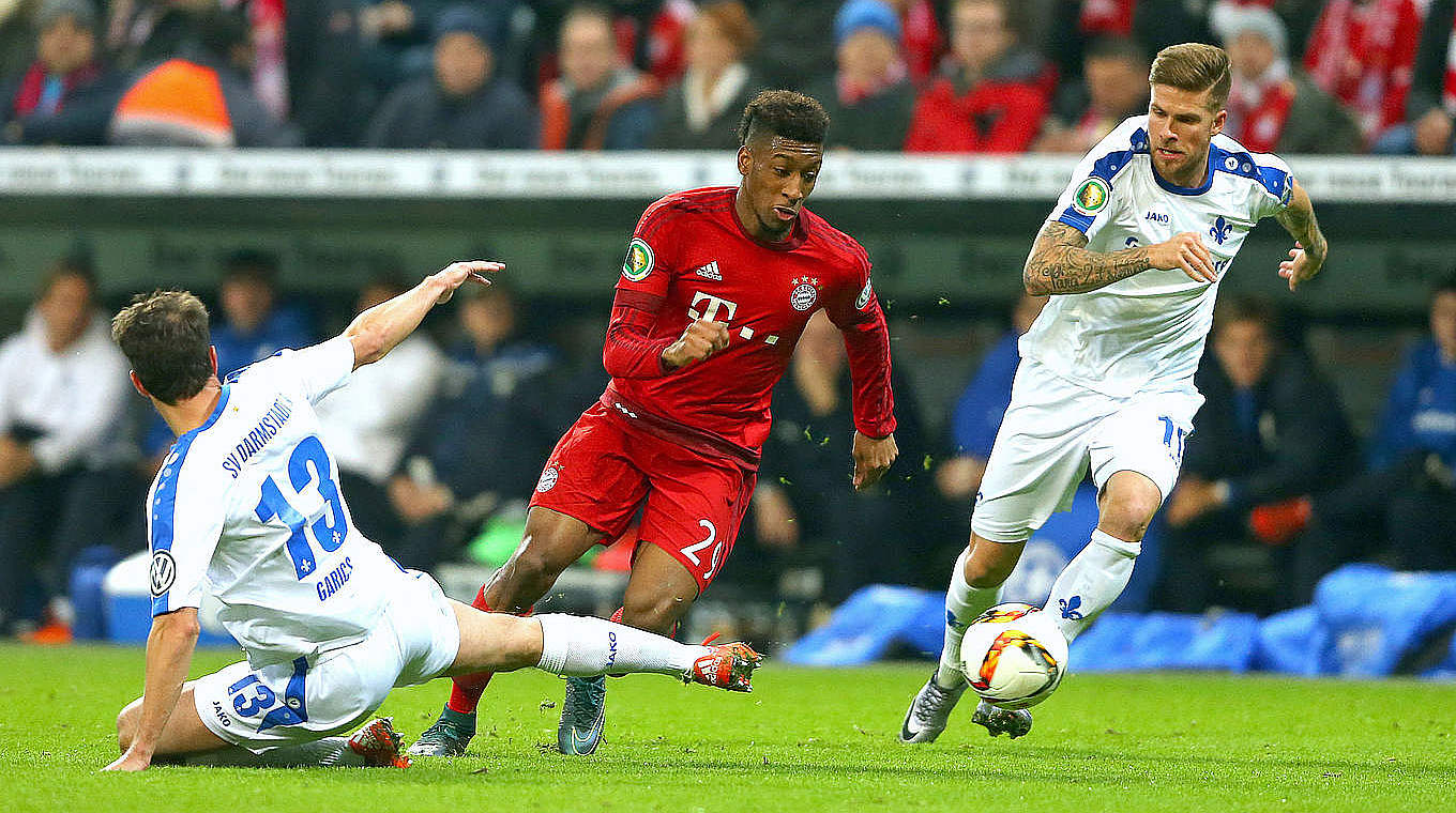 Coman beats his marker on the wing © 